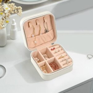 Your Jewelry’s Perfect Travel Companion Keep your precious accessories secure with the Portable Mini Travel Jewelry Box. Compact yet spacious, it fits neatly in your bag, ensuring your jewelry stays organized and tangle-free on the go.